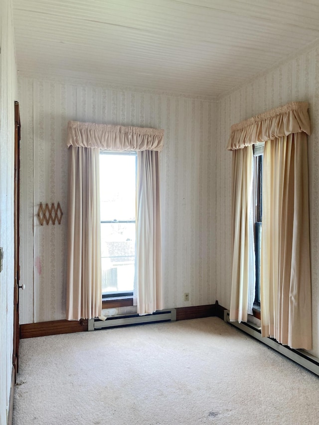 119 E Orchard St, West Manchester, OH 45382 - unfurnished room featuring wallpapered walls, carpet, and baseboard heating