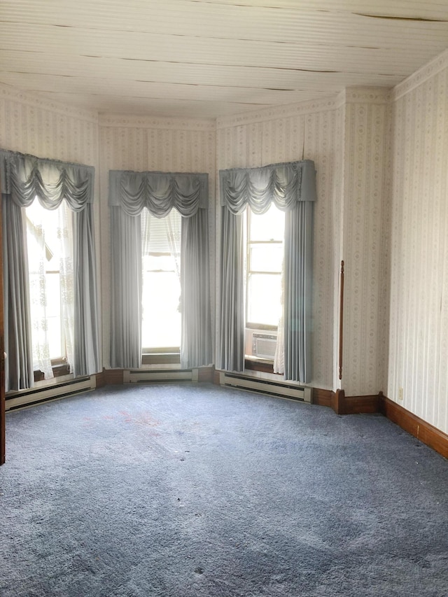 119 E Orchard St, West Manchester, OH 45382 - carpeted empty room with a baseboard radiator, healthy amount of natural light, wood ceiling, wallpapered walls, and cooling unit