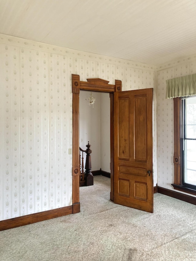 119 E Orchard St, West Manchester, OH 45382 - carpeted empty room with wallpapered walls