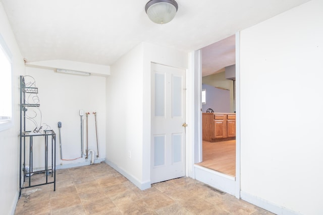 interior space featuring visible vents and baseboards