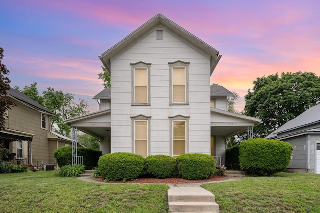 815 Mckaig Ave, Troy, OH 45373 - traditional-style home with a yard and central air condition unit