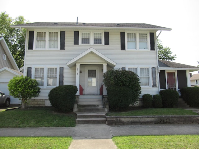 colonial inspired home with entry steps