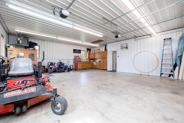 6565 Windjammer Dr, Huntsville, OH 43324 - garage featuring a garage door opener