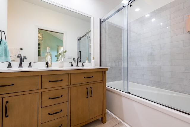 6565 Windjammer Dr, Huntsville, OH 43324 - full bath with double vanity and bath / shower combo with glass door