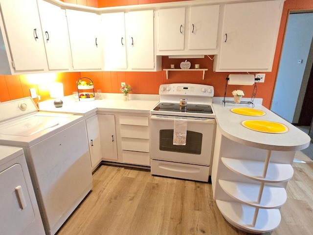 1134 Cedarview Dr, Springfield, OH 45503 - kitchen with white electric range oven, separate washer and dryer, open shelves, and light wood-style flooring