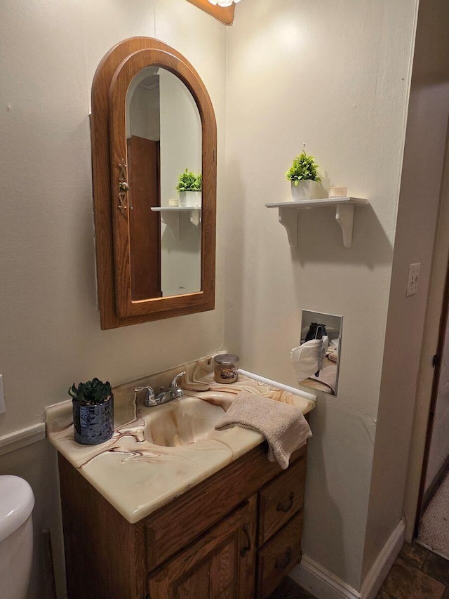 1134 Cedarview Dr, Springfield, OH 45503 - bathroom featuring vanity, toilet, and baseboards