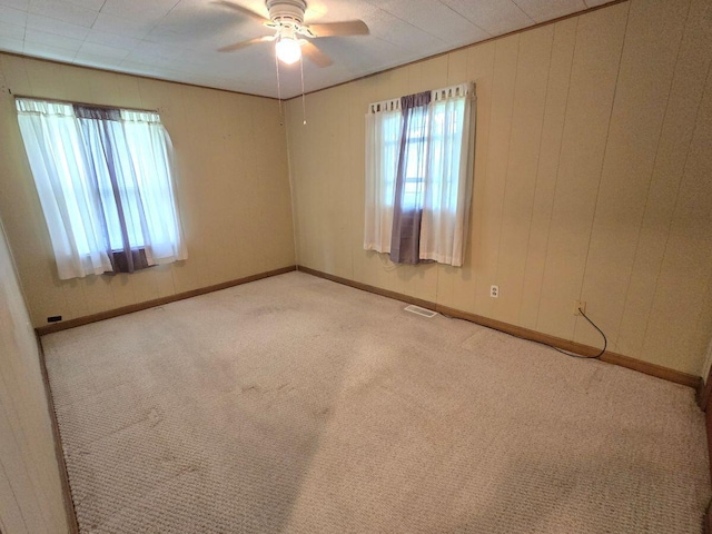 1134 Cedarview Dr, Springfield, OH 45503 - empty room featuring carpet, a ceiling fan, and baseboards