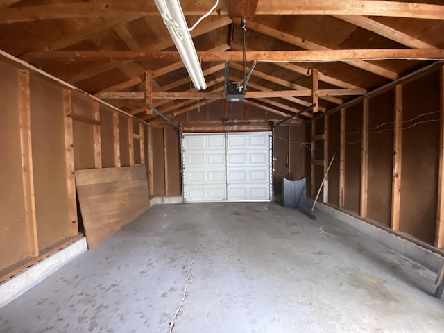823 Robinson Ave, Piqua, OH 45356 - garage featuring a garage door opener