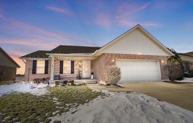 ranch-style home featuring a garage