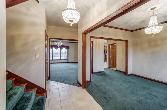 carpeted entrance foyer featuring a notable chandelier and crown molding