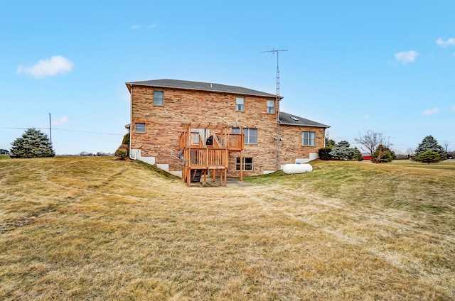 rear view of property featuring a playground and a lawn