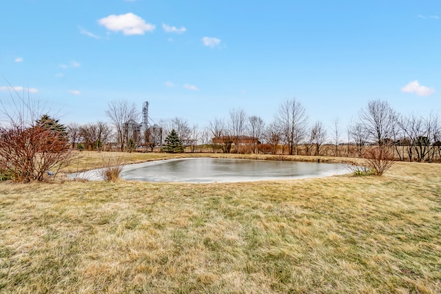 view of yard with a water view