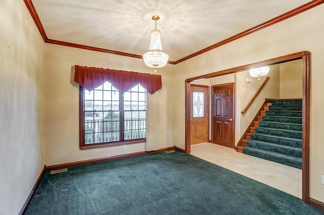 carpeted foyer entrance featuring crown molding and a notable chandelier