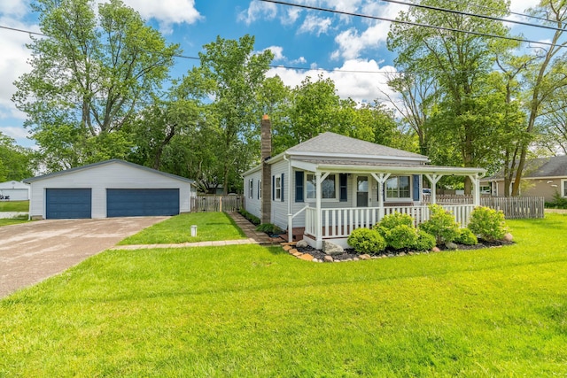 4209 State Route 41, Troy, OH 45373 - view of front facade featuring a porch, a detached garage, an outdoor structure, and a chimney