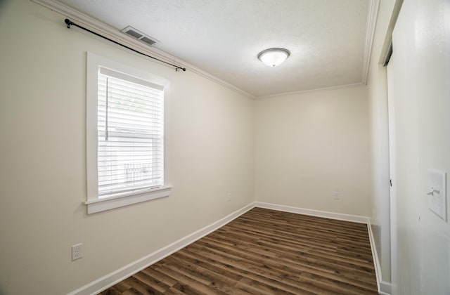 4209 State Route 41, Troy, OH 45373 - unfurnished room with dark wood-style flooring, baseboards, crown molding, and a textured ceiling