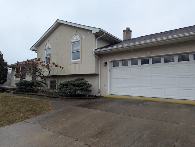 tri-level home featuring a garage