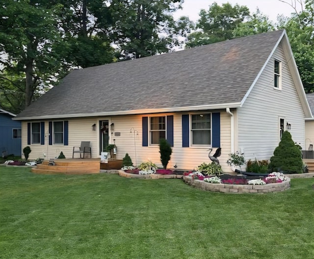10141 Mohawk Dr, Huntsville, OH 43324 - view of front of property with a front yard and roof with shingles