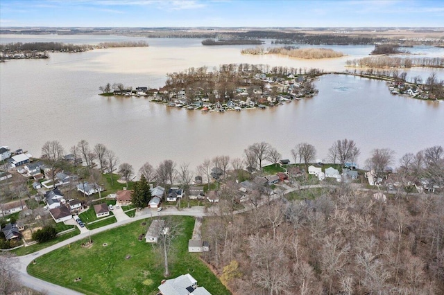 bird's eye view featuring a water view and a residential view