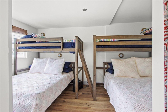 bedroom featuring wood finished floors