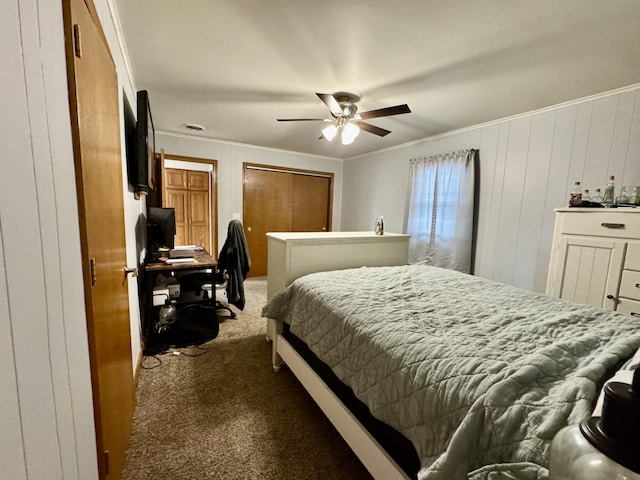 641 Washington St, Versailles, OH 45380 - bedroom featuring carpet flooring, crown molding, a ceiling fan, and wooden walls