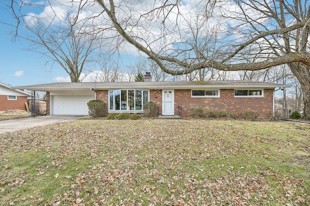 ranch-style house featuring brick siding, a chimney, concrete driveway, a front yard, and a garage