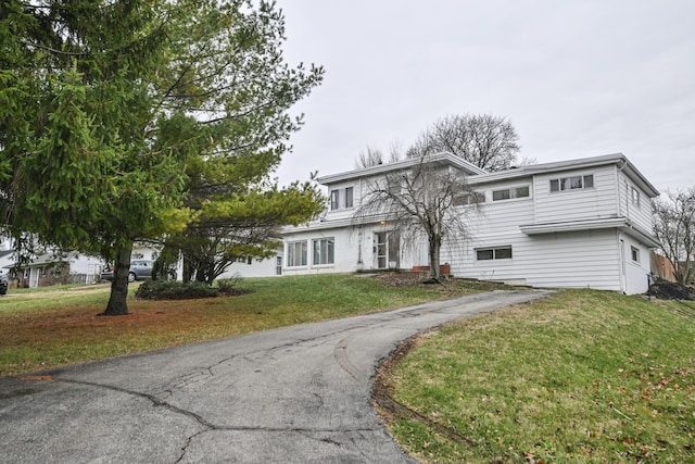 view of property featuring a front yard