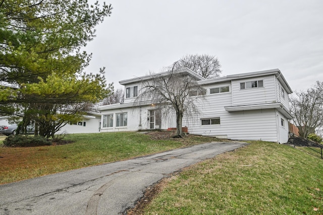 view of front property with a front lawn