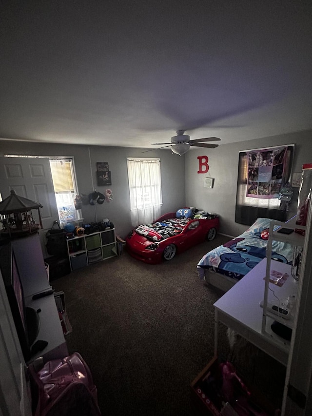 carpeted bedroom with ceiling fan