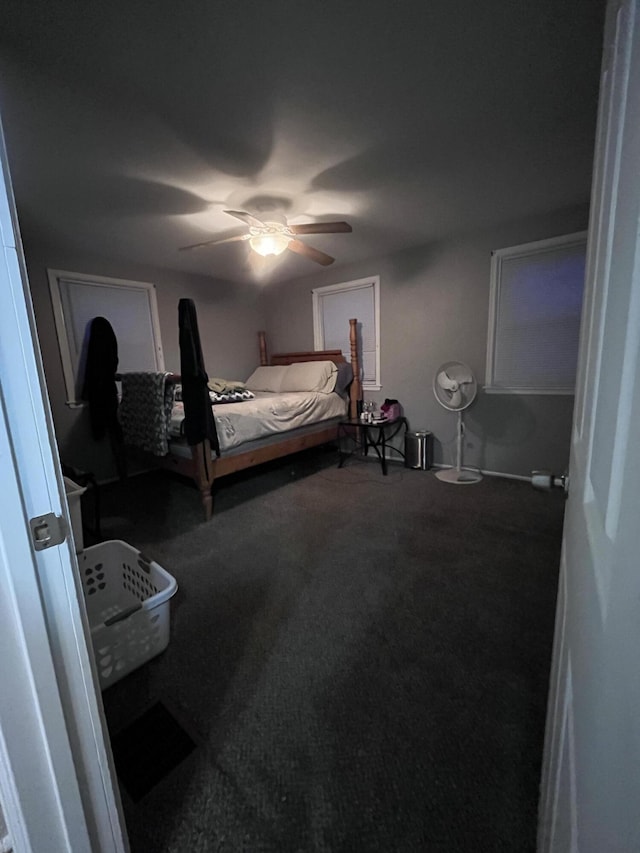 carpeted bedroom with ceiling fan