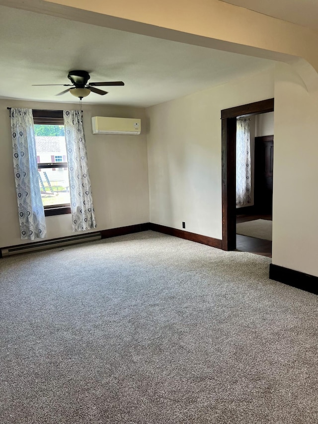 9969 State Route 49, Rockford, OH 45882 - spare room featuring an AC wall unit, ceiling fan, carpet flooring, and baseboard heating