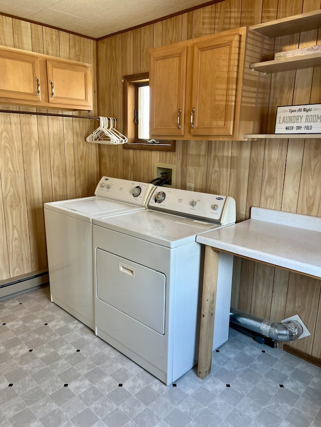 9969 State Route 49, Rockford, OH 45882 - washroom featuring cabinet space, separate washer and dryer, wood walls, light floors, and a baseboard radiator
