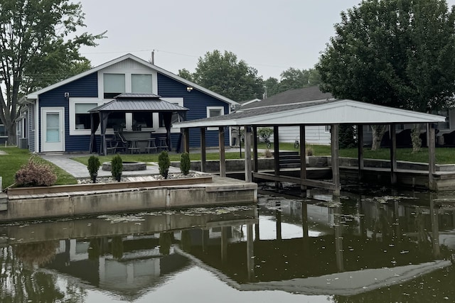 11546 Horseshoe Channel Dr, Lakeview, OH 43331 - dock area featuring a gazebo, a water view, and boat lift