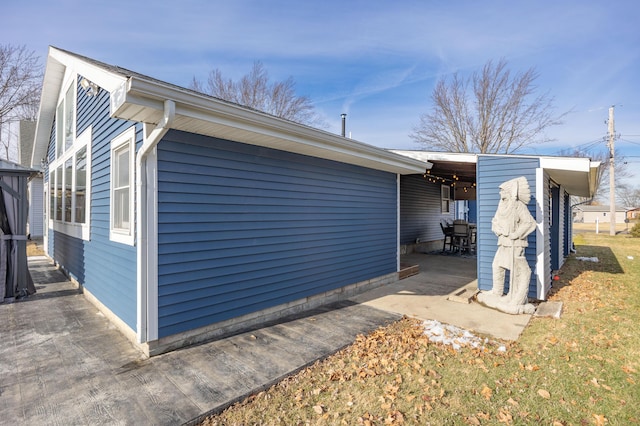 11546 Horseshoe Channel Dr, Lakeview, OH 43331 - view of side of property featuring a patio area