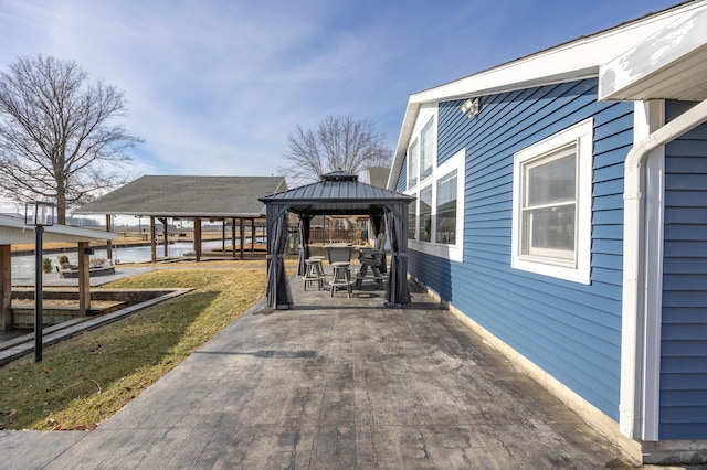 exterior space featuring a gazebo and a patio