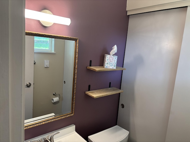 1353 Lee Rd, Troy, OH 45373 - half bathroom featuring toilet and vanity