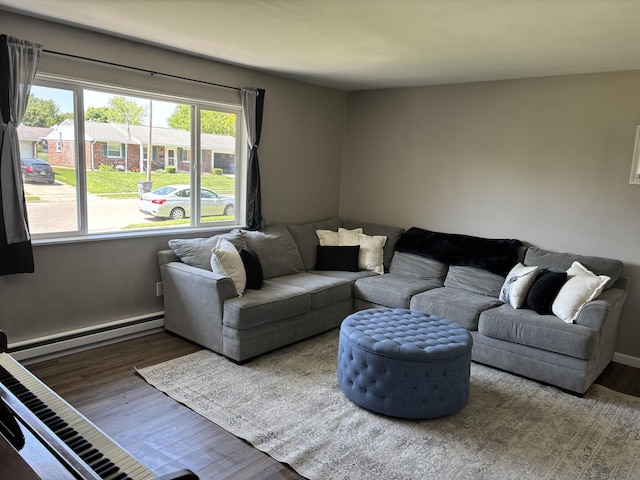 1353 Lee Rd, Troy, OH 45373 - living area featuring a baseboard radiator and wood finished floors