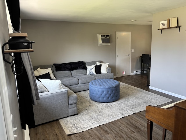 1353 Lee Rd, Troy, OH 45373 - living room featuring an AC wall unit, a baseboard heating unit, dark wood finished floors, and baseboards