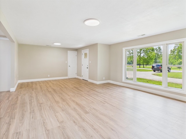 1430 E Union City Pike E, Union City Pike, Winchester, IN 47394 - unfurnished living room featuring light wood-style floors and baseboards