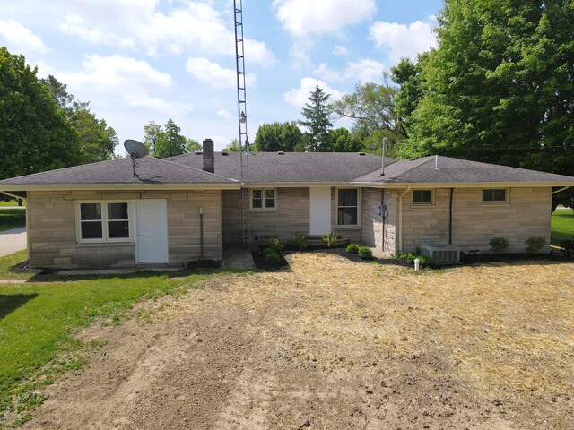 1430 E Union City Pike E, Union City Pike, Winchester, IN 47394 - back of house featuring stone siding, a shingled roof, and a chimney