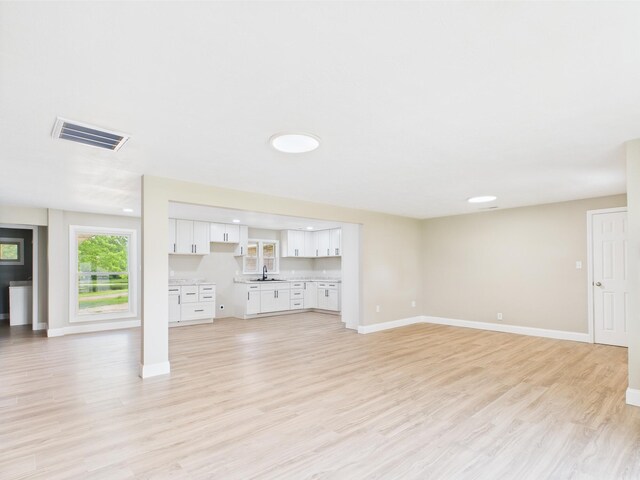 1430 E Union City Pike E, Union City Pike, Winchester, IN 47394 - unfurnished living room with light wood-type flooring