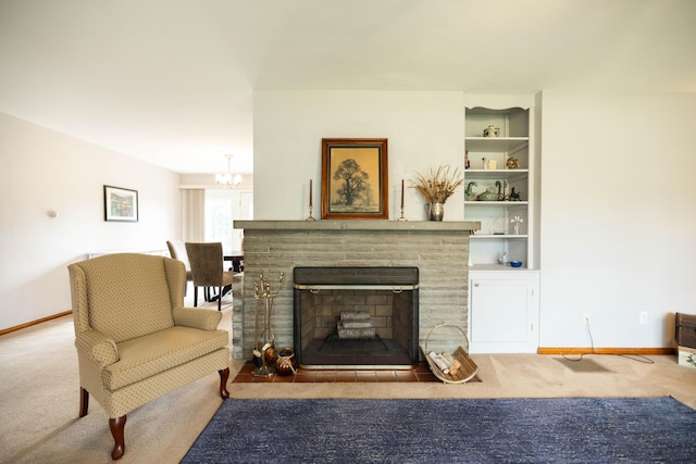 1706 N Fountain Blvd, Springfield, OH 45504 - living room with carpet floors, a chandelier, and a fireplace