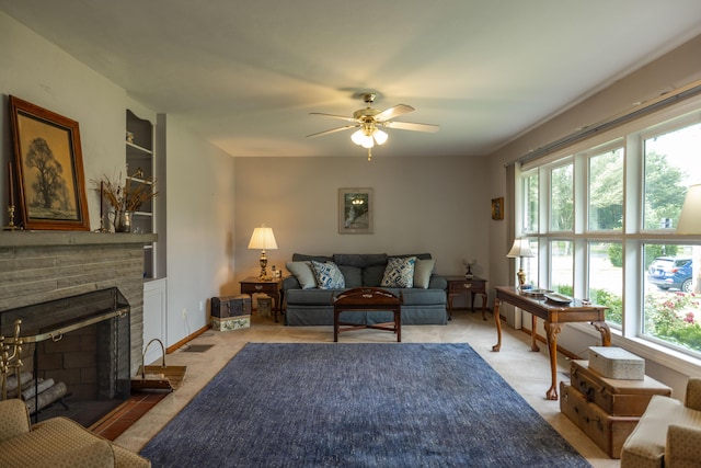 1706 N Fountain Blvd, Springfield, OH 45504 - living room with healthy amount of natural light, a ceiling fan, and light colored carpet