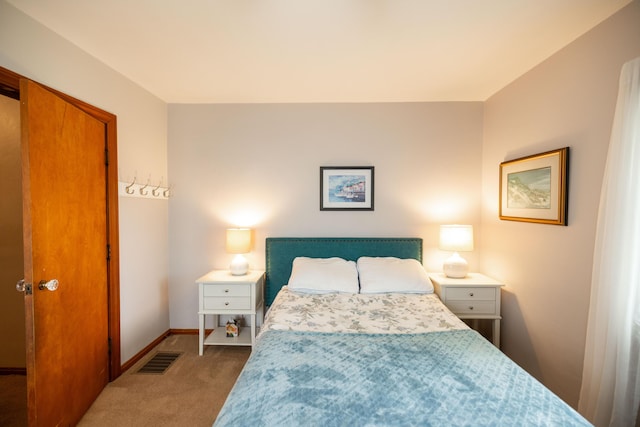 1706 N Fountain Blvd, Springfield, OH 45504 - carpeted bedroom featuring baseboards