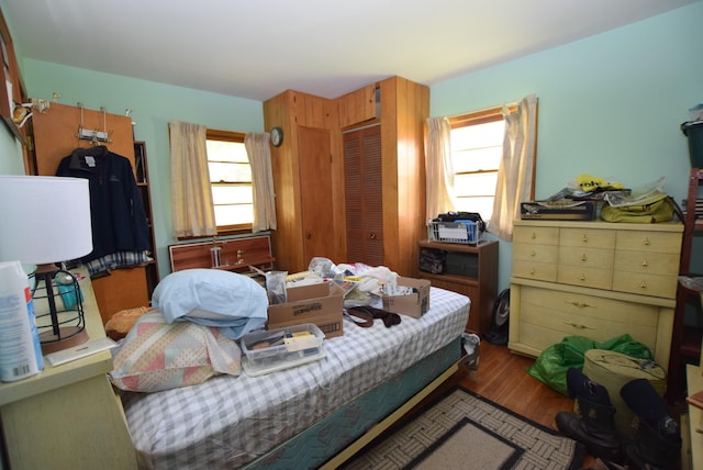 718 Center Ave, Russells Point, OH 43348 - bedroom with a closet and wood finished floors