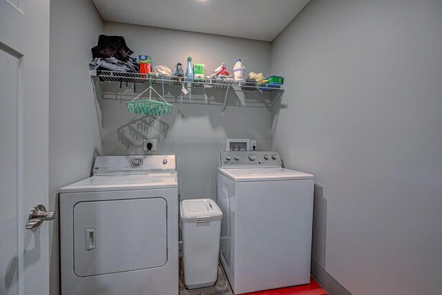 1313 Arrowhead, Piqua, OH 45356 - laundry area featuring washing machine and dryer and wood finished floors