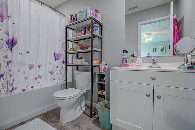 1313 Arrowhead, Piqua, OH 45356 - bathroom featuring vanity, wood finished floors, shower / bathtub combination with curtain, and a ceiling fan