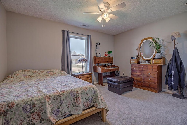 1313 Arrowhead, Piqua, OH 45356 - carpeted bedroom featuring a textured ceiling and a ceiling fan