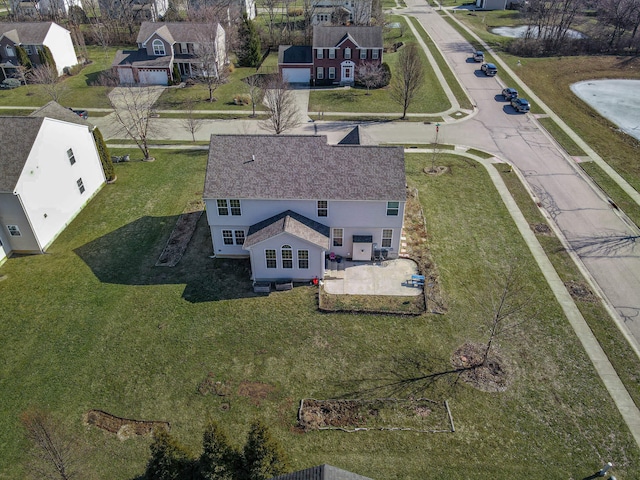 drone / aerial view with a residential view