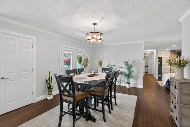 1814 Kingsbury Dr, Saint Marys, OH 45885 - dining area with a textured ceiling, french doors, wood finished floors, a chandelier, and ornamental molding