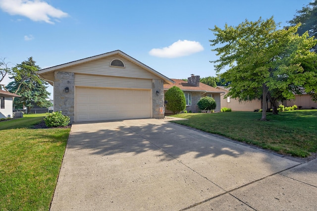 1814 Kingsbury Dr, Saint Marys, OH 45885 - ranch-style house with driveway, an attached garage, a front yard, and stone siding